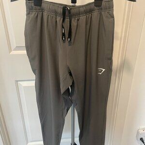 Gymshark Arrival Woven Joggers - Charcoal Grey